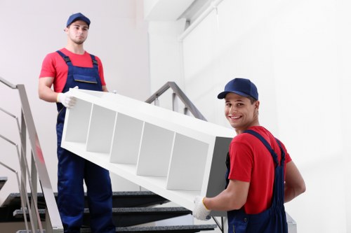 Moving house support in Lisson Grove with boxes and furniture ready for transport