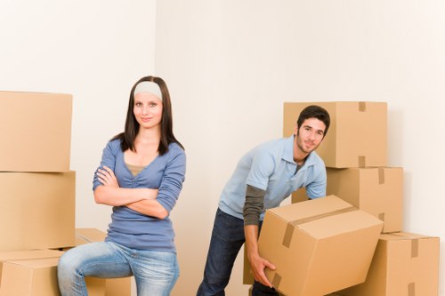 Loading furniture into a removals van for a flat move
